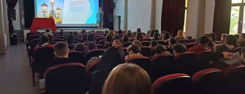 Here is a photo from public from one's of Alina's conferences regarding teenagers