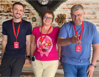 Alina with the other two professionals holding the camp